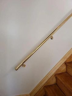 a stair rail in the corner of a room