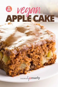 a close up of a piece of cake on a plate with the words vegan apple cake