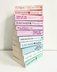 a stack of books sitting on top of each other