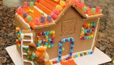 a gingerbread house decorated with candy and candies