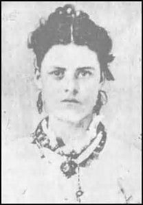 an old black and white photo of a woman