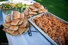 a buffet table filled with different types of food