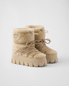 Ecru Shearling Après Ski Booties | PRADA Apres Ski Boots, Funky Shoes, Shoe Inspo, Aesthetic Shoes, Swag Shoes, Ski Boots, Pretty Shoes, Dream Shoes