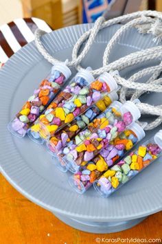 several candy bars are tied up on a plate