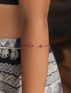 travel around the world minimalist tattoo Mini Travel Tattoos, Plane Tattoo Ideas, Travel Tatoos Woman, Train Tattoos For Women, Small Airplane Tattoo, Duo Tattoos, Travel Inspired Tattoos, Tattoo Duo, Small Travel Tattoos