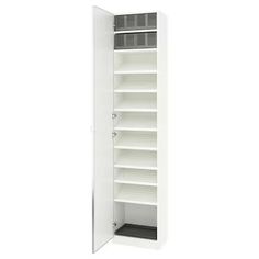 an empty white cabinet with shelves in it