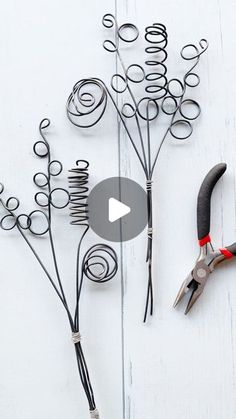 scissors and wire on a white wooden surface with text overlay that reads how to make wire flowers