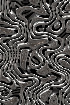 an abstract pattern made up of silver and black metal foil, with wavy lines in the middle