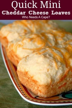 a close up of bread on a plate with the words quick mini cheddar cheese loaves