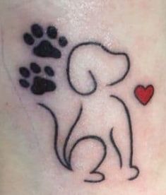 a small tattoo with a dog and a heart on the side of its leg that says i love you