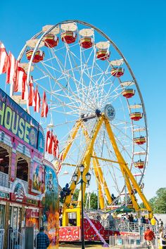 a ferris wheel and rides at an amusement park