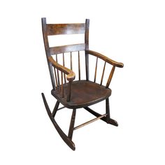 an old wooden rocking chair on a white background