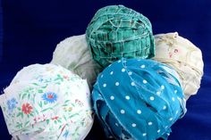 four different types of cloth covered balls