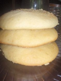 two cookies sitting on top of a cooling rack