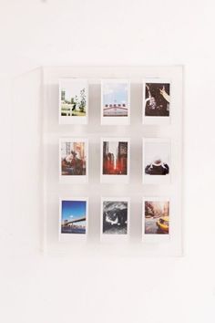 a white wall with several different pictures on it