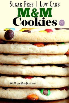 a stack of cookies with m & m candies on top and the words, sugar free low carb m & m cookies