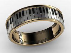 a wedding band with musical notes on the inside and inlayed to it's sides