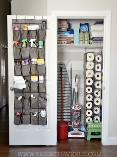 an organized closet with toiletries and other items in it, including rolls of toilet paper