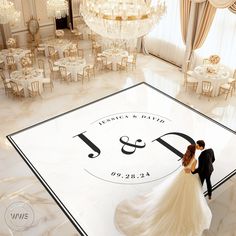 a bride and groom standing on the dance floor at their wedding reception in an elegant ballroom