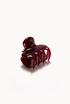 Handmade in Italy and crafted from the highest quality resin. 100% Recyclable. The Claw Clip is back and quintessential for all carefree hair days. Not your average claw clip, this one is made to last the clip is fastened with a long-lasting spring closure and polished to a glass-like shine. Bordeaux is a deep and sophisticated burgundy; its translucency gives it a realistic liquid-like glow. Purse Trinkets, Jungle Outfit, The Undone, The Claw, Claw Clips, Recycled Bottles, Everyday Hairstyles, Mid Size, Hair Claws & Clips