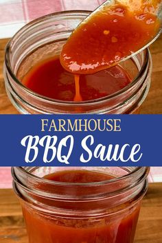 a spoon full of bbq sauce on top of a wooden table next to a jar