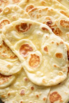 several flat breads sitting on top of each other