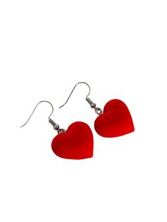 Elevate your jewelry collection with our Minimalistic Red Heart Earrings. Designed with a unique touch, these earrings feature vibrant red hearts that effortlessly catch the eye. Created with precision, they come with in silver hooks. Built to withstand daily wear, they're fully waterproof, ensuring they stay as stunning as the day you first wore them. Perfect for adding a pop of color and elegance to any outfit. Red Heart Earrings, Red Hearts, Summer Accessories, Sunglasses Shop, Pickleball, Heart Earrings, The Eye, Vibrant Red, Red Heart