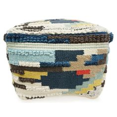 a multicolored basket is shown on a white background and it's made out of woven material