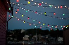 colorful lights are strung across the night sky