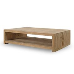 a wooden coffee table sitting on top of a white floor