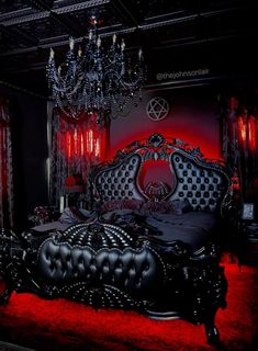 a gothic bedroom with red lighting and black bedding, chandelier and curtains