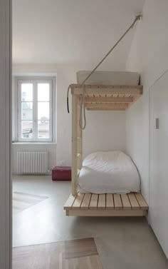 a bunk bed in the corner of a room