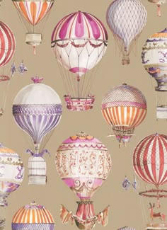 many colorful hot air balloons flying in the sky