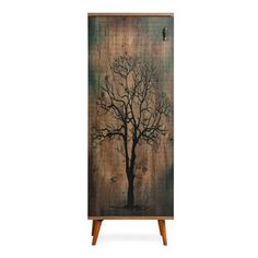 a tall cabinet with a tree painted on it