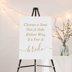 a sign that says choose a seat not a side either way it's for a bride