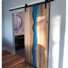 the sliding door is painted with blue water