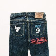 Vintage blue denim 90s early 2000s y2k original Von Dutch jeans. Von Dutch logo motorcycle graphic motifs on back. plain on the front  Straight leg / baggy relaxed fit  Size waist 32 inch, inside leg 32 inch  Good condition  FULLY TRACKABLE SHIPPING SERVICE  UK AND WORLDWIDE SHIPPING Von Dutch Pants, Biker Denim Bottoms For Streetwear, Casual Straight Leg Jeans For Biker Events, Biker Style Straight Leg Jeans For Streetwear, 90s Style Blue Jeans For Streetwear, 90s Blue Jeans For Streetwear, Von Dutch Jeans, Y2k Jeans, Von Dutch