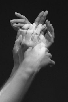 two hands reaching up towards each other with the words awesome god above them in black and white