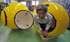 shoji tanaka, president of new cosmopower, demonstrates the use of the 'noah' emergency living capsule  image © itsuo inouye (AP)      the fiberglass 'noah' capsule by japanese company new cosmopower is a personal-sized work   of emergency architecture, offering shelter in the event of earthquake or tsunami.    watersafe although not fire-resistant, 'noah' measures 1.2 meters (4 feet) in diameter and can house   up to four adults, costing approximately 3900 USD. entered through a locking hatch,   the cabin has a small lookout window and breathing holes, while its bright yellow colour   makes it easy to be located by rescue crews. the device has been heavily tested for safety and durability.    the company is also working on models that fit six and twelve persons. Lazy Boy Recliner, Escape Pod, Sweet Station, Lazy Boy, Survival Shelter, Noahs Ark, Life Savers, Natural Disasters, Industrial Design