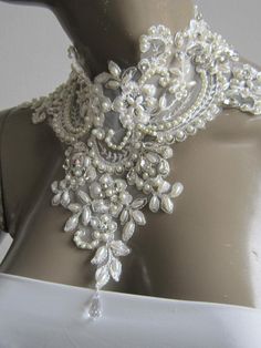 Lace Bridal Necklace Ivory Lace Statement Necklace pearl and crystal stone lace necklace Please get in touch for more information. Thank you so much for choosing my store. It is very importent to let my customers happy, so dont hesitate to contact me for your questions. Standart shipping I ship from Turkey , General delivery durations are USA : 12 /20 days Canada : 10/20days Australia: 15/25 days Wedding Pearl Necklace With Rhinestones, Pearl White Rhinestone Necklace For Wedding, Pearl White Beaded Choker For Wedding, White Pearl Bridal Necklace With Rhinestones, Rhinestone Choker Bridal Necklace For Wedding, Bridal Rhinestone Choker Necklace For Wedding, Bridal Rhinestone Choker For Wedding, Wedding Bridal Rhinestone Choker Necklace, Crystal Embellished Necklaces For Wedding