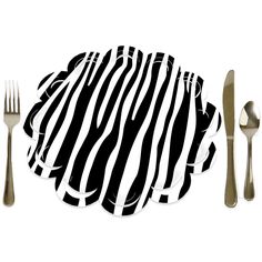 a black and white striped plate with silverware on the side next to it is a fork, knife, and spoon