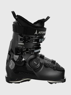 a pair of black ski boots sitting on top of each other