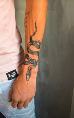 a person with a tattoo on their arm