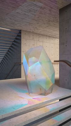 an abstract sculpture is shown in the middle of a room with stairs leading up to it