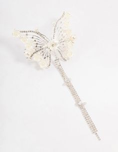 Elevate your bridal look with the eye-catching silver floral diamante butterfly clip. Crafted from sleek silver, it combines floral elegance with a bold butterfly design, adding whimsical flair to your ensemble. Material: Crystal Dimensions: Length 185 mm x Width 90 mm | Lovisa Silver Floral Diamante Butterfly Clip Butterfly Clips, Bridal Look, Butterfly Design, Bridal Looks, Hair Clips, Hair Accessories, Sleek, Money, Crystals