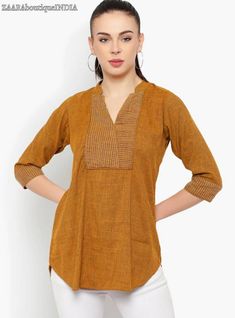 HAND CRAFTED DRESS DESCRIPTION *Mustard solid Tunic, has a V-neck, three-quarter sleeves, and Embroidered detail *Fabric:- Material: Cotton *Wash Care:- Machine Wash AVAILABLE IN 11 SIZES THEY ARE IN FOLLOWING MEASUREMENTS IN INCHES:- XS:- Bust-34/Waist-32/Length-29 S:- Bust-36/Waist-34/Length-29 M:- Bust-38/Waist-36/Length-29.5 L:- Bust-40/Waist-38/Length-29.5 XL:- Bust-42/Waist-40/Length-30 XXL:- Bust-44/Waist-42/Length-30.5 3XL:- Bust-46/Waist-44/Length-31 4XL:- Bust-48/Waist-46/Length-31 5XL Short Kurtis For Women, Tunics For Women, Short Kurtis, Kurtis For Women, Short Tunic, Cotton Tunic, Womens Tunics, Three Quarter Sleeves, Summer Wear