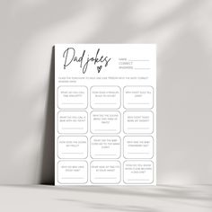 the printable daily planner for dads is shown on a table next to a gray wall