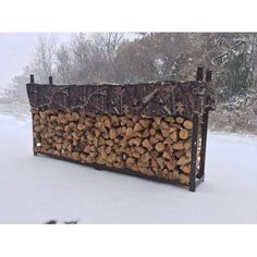 a firewood log rack in the snow