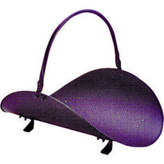 a purple purse sitting on top of a white table next to a black object in the shape of a cone