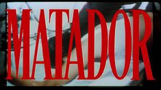 the words matador are in red and black